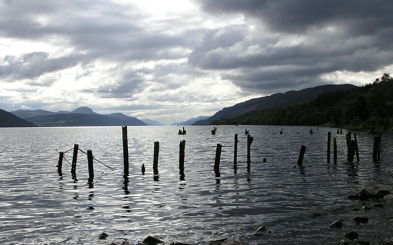 Lake with wooden posts