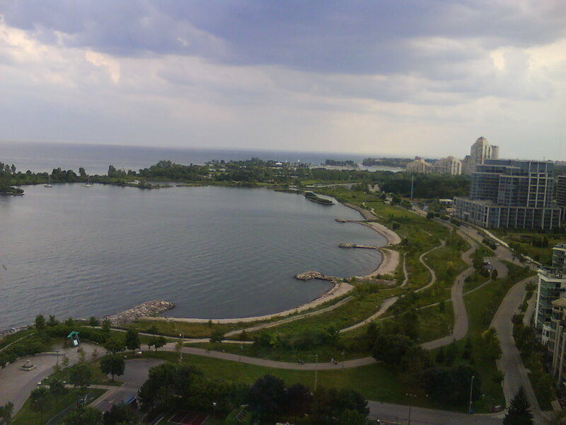 Lakefront park with city view