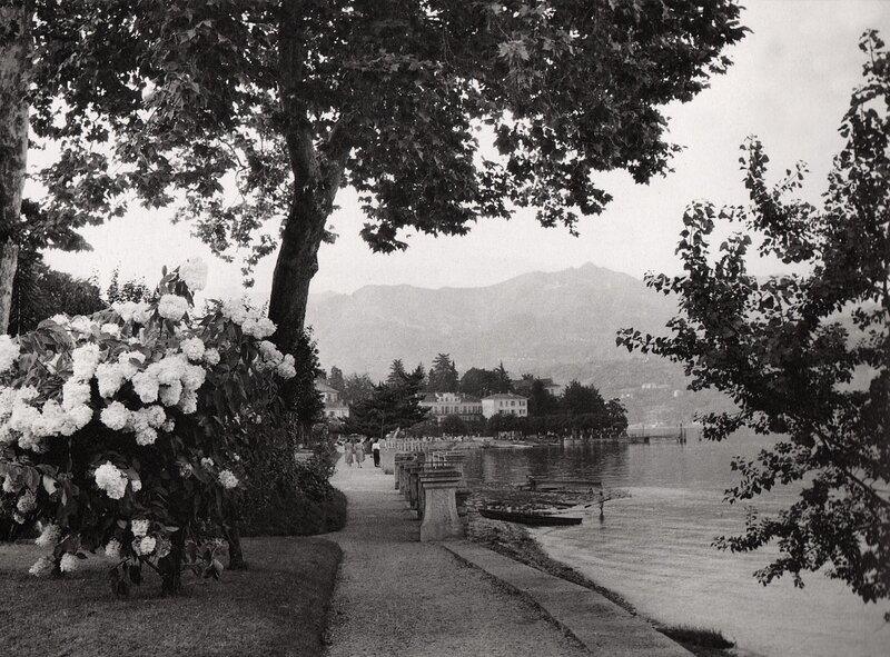 Lakefront path with mountains