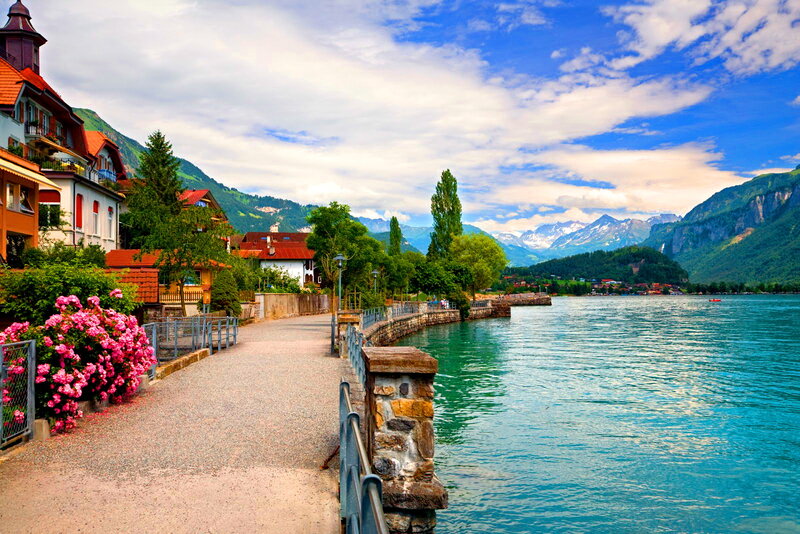 Lakefront Town with Mountains