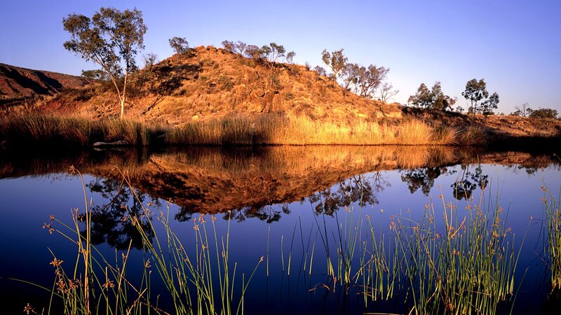 Lakeside hill at sunset