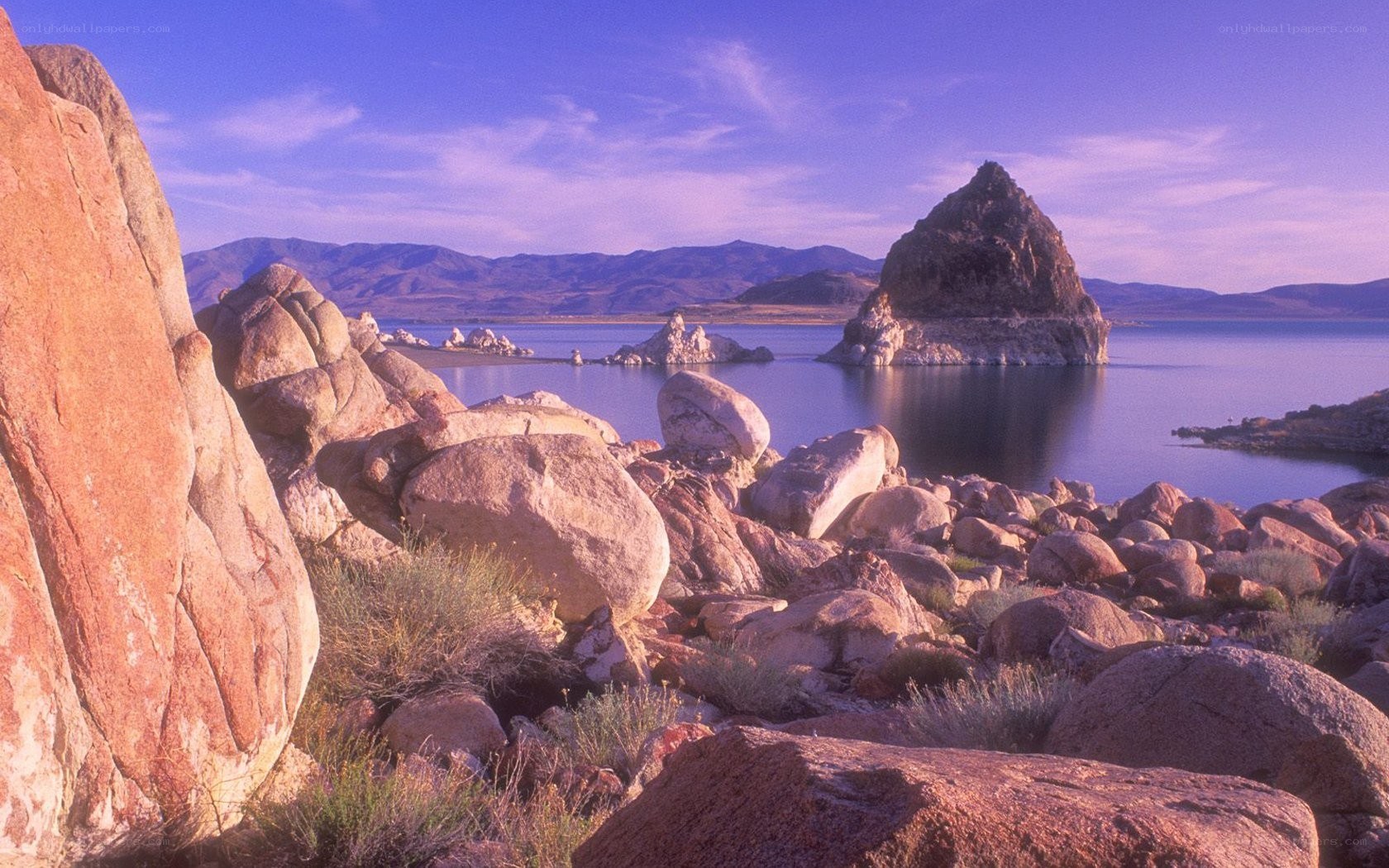 Lakeside rocks and mountains