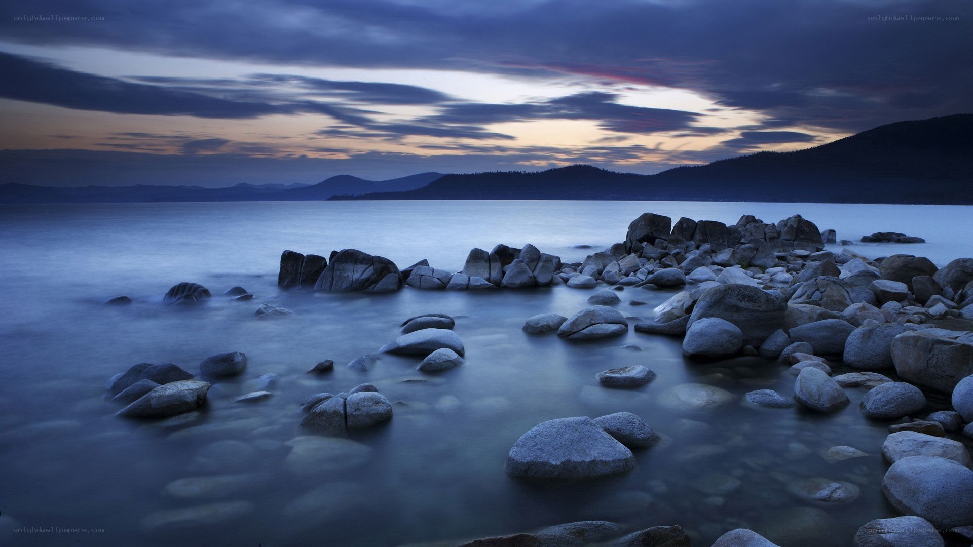 Lakeside rocks at dusk