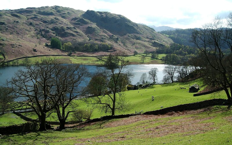 Lakeside valley with hills