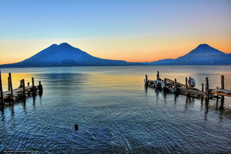 Lakeside view with volcanoes