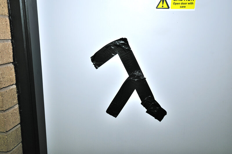 Lambda symbol on door