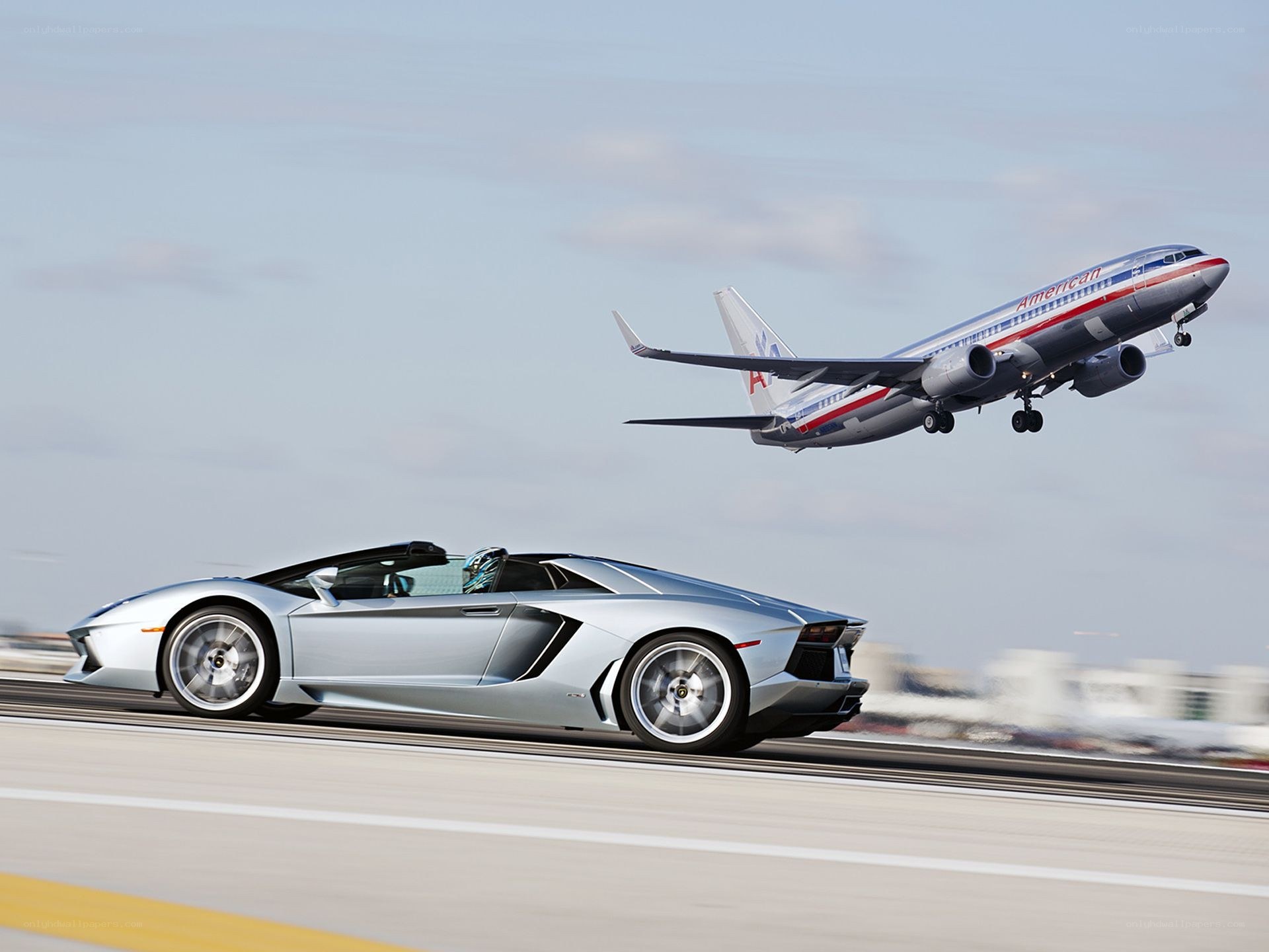 Lamborghini and airplane on runway