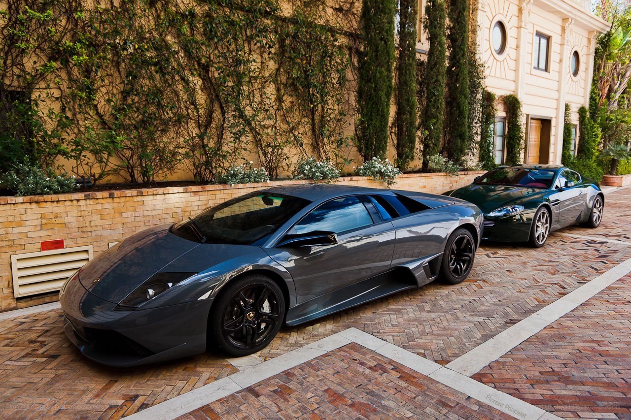 Lamborghini and Aston Martin parked