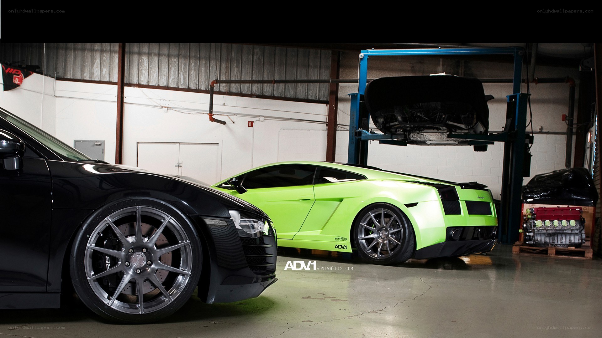 Lamborghini and Audi in garage