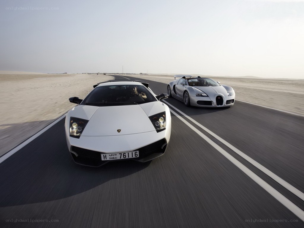 Lamborghini and Bugatti on desert road