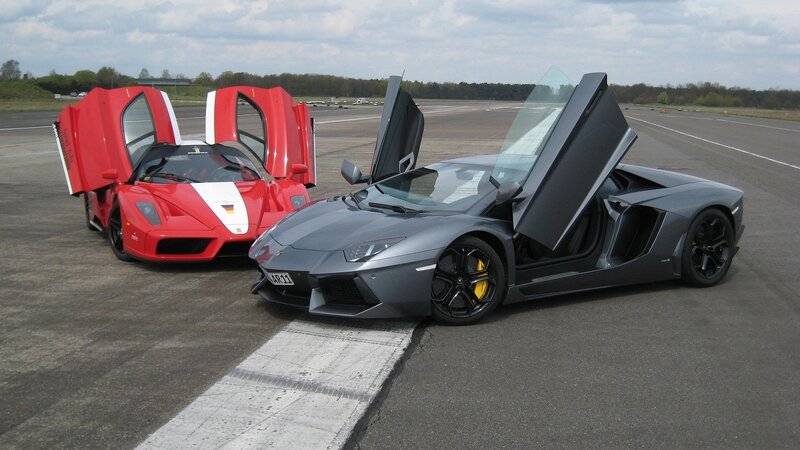 Lamborghini and Ferrari on a racetrack