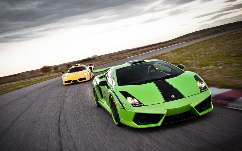 Lamborghini and Ferrari on a racetrack