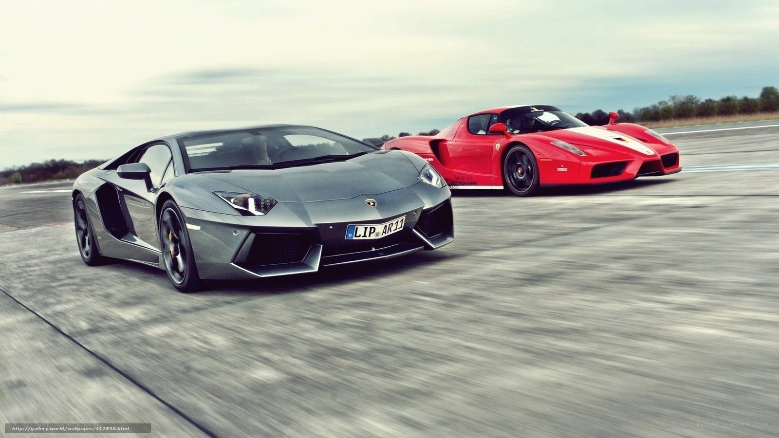 Lamborghini and Ferrari on track