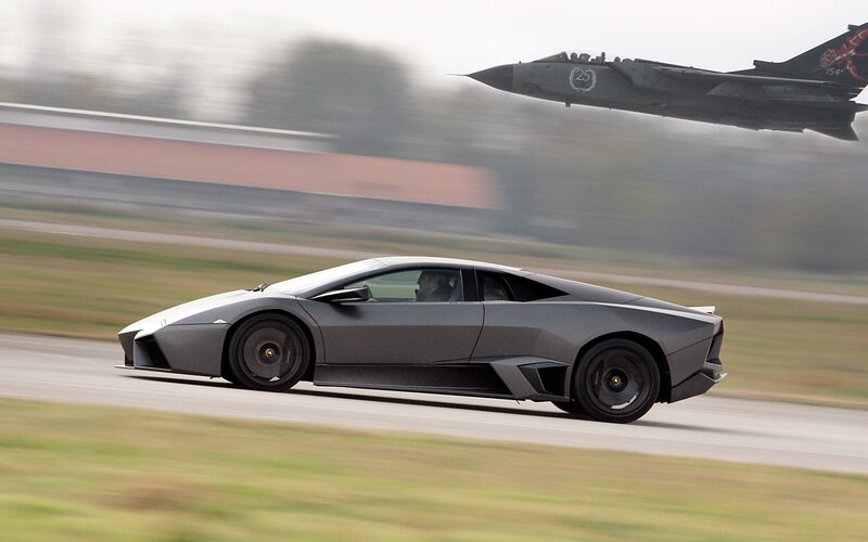Lamborghini and jet on a runway