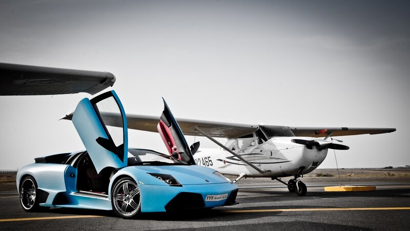 Lamborghini and small plane