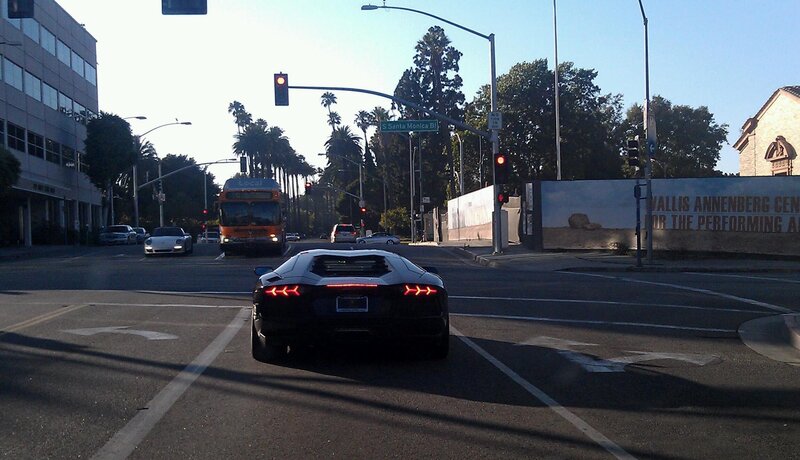 Lamborghini at a city intersection