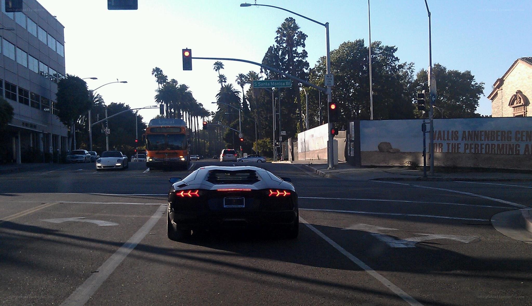 Lamborghini at a city intersection