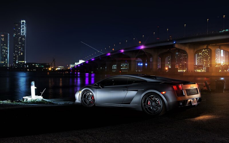 Lamborghini at night by the bridge