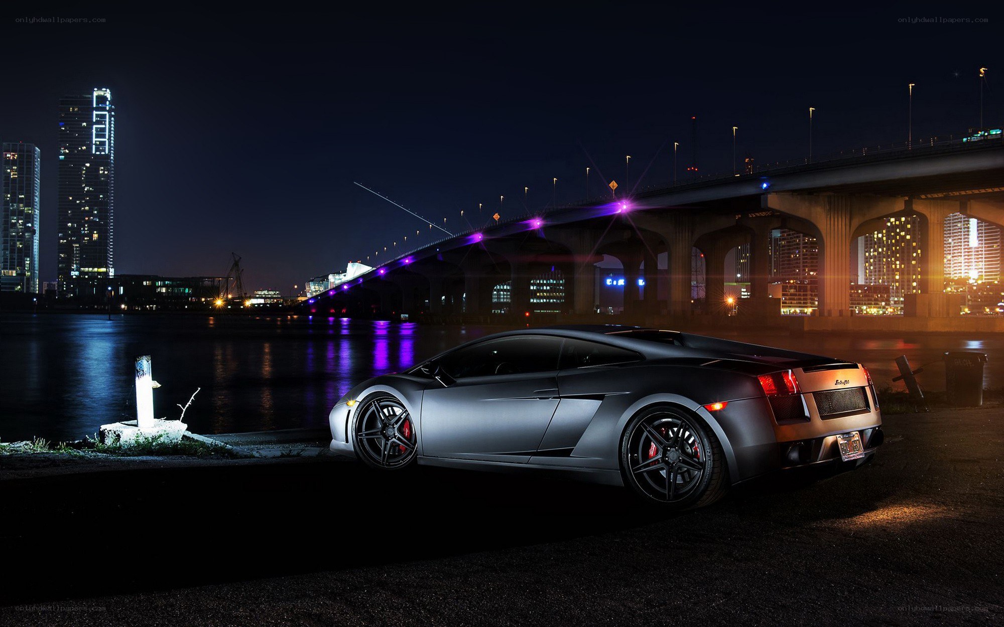 Lamborghini at night by the bridge