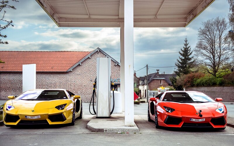 Lamborghini cars at gas station