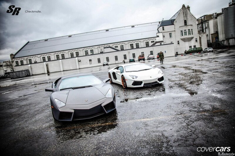 Lamborghini cars on wet pavement