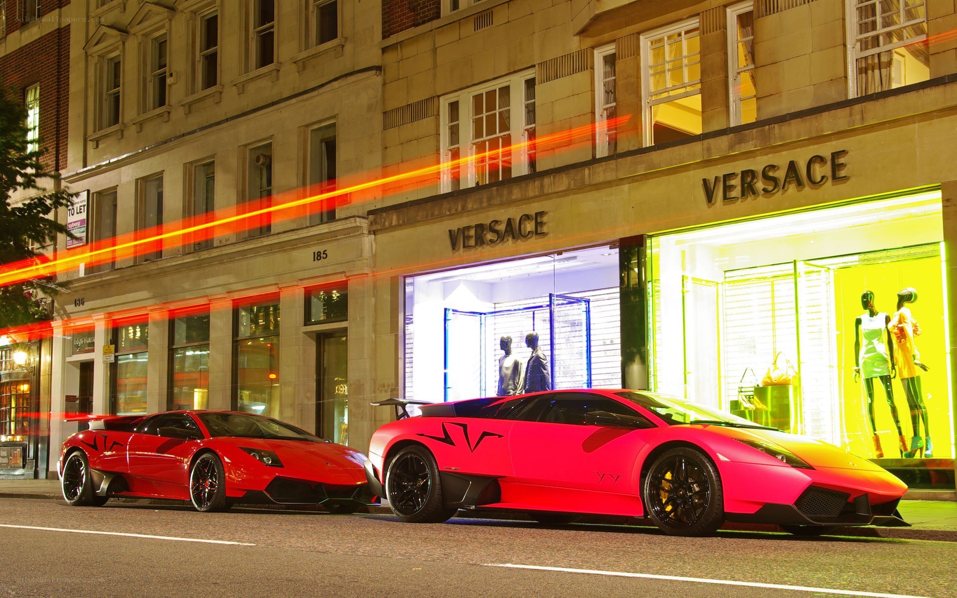 Lamborghini cars outside Versace