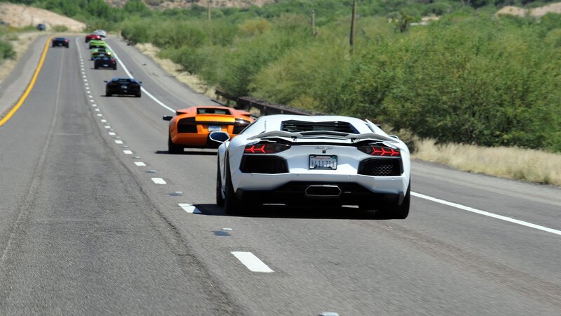 Lamborghini convoy on highway