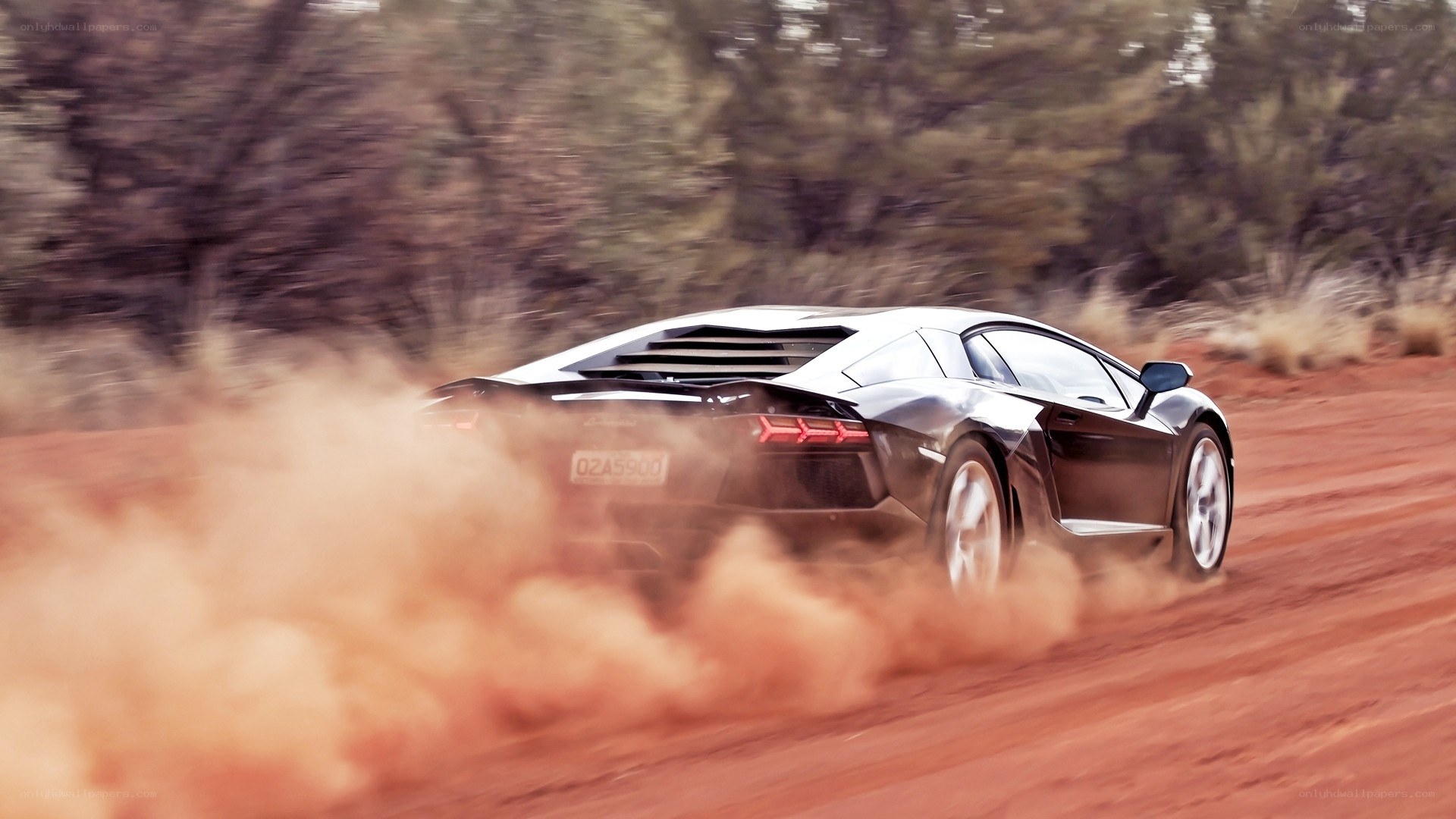Lamborghini drifting on dirt road