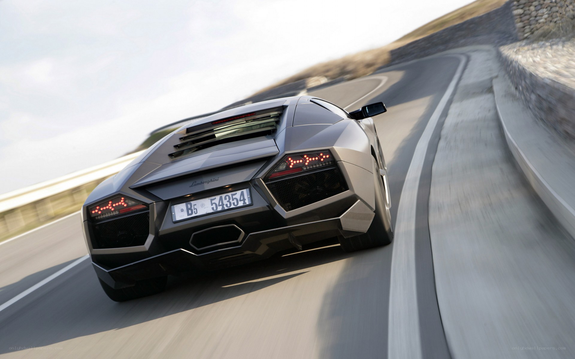 Lamborghini driving on winding road