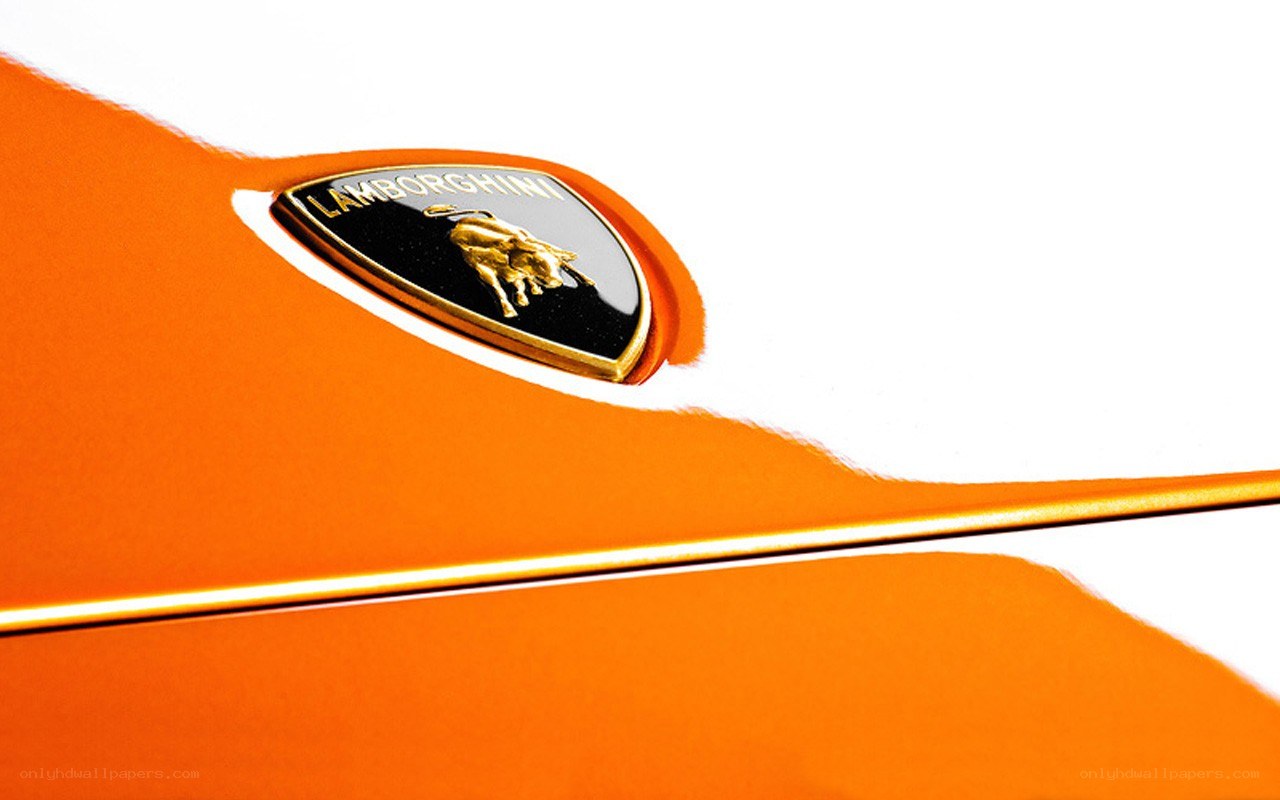Lamborghini emblem on orange car