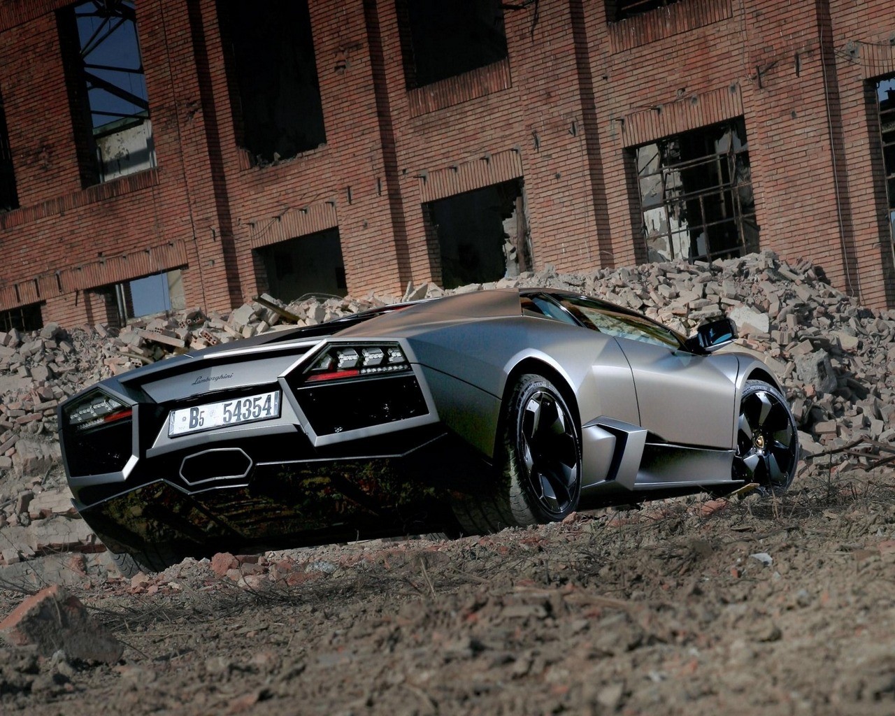 Lamborghini in a rubble field