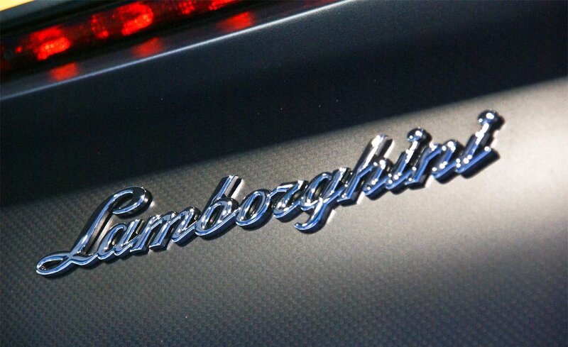 Lamborghini Logo on Car — Black, Dramatic, Photograph