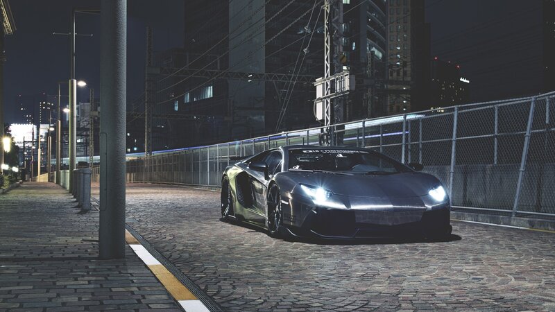 Lamborghini on a city street at night