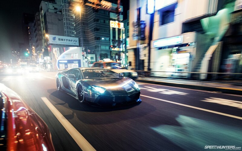 Lamborghini on a city street at night