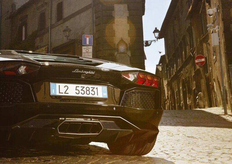 Lamborghini on a cobblestone street