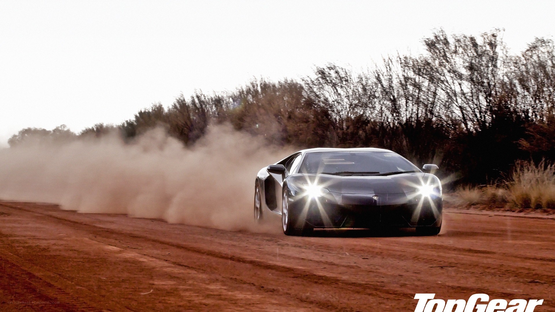 Lamborghini on a dirt road