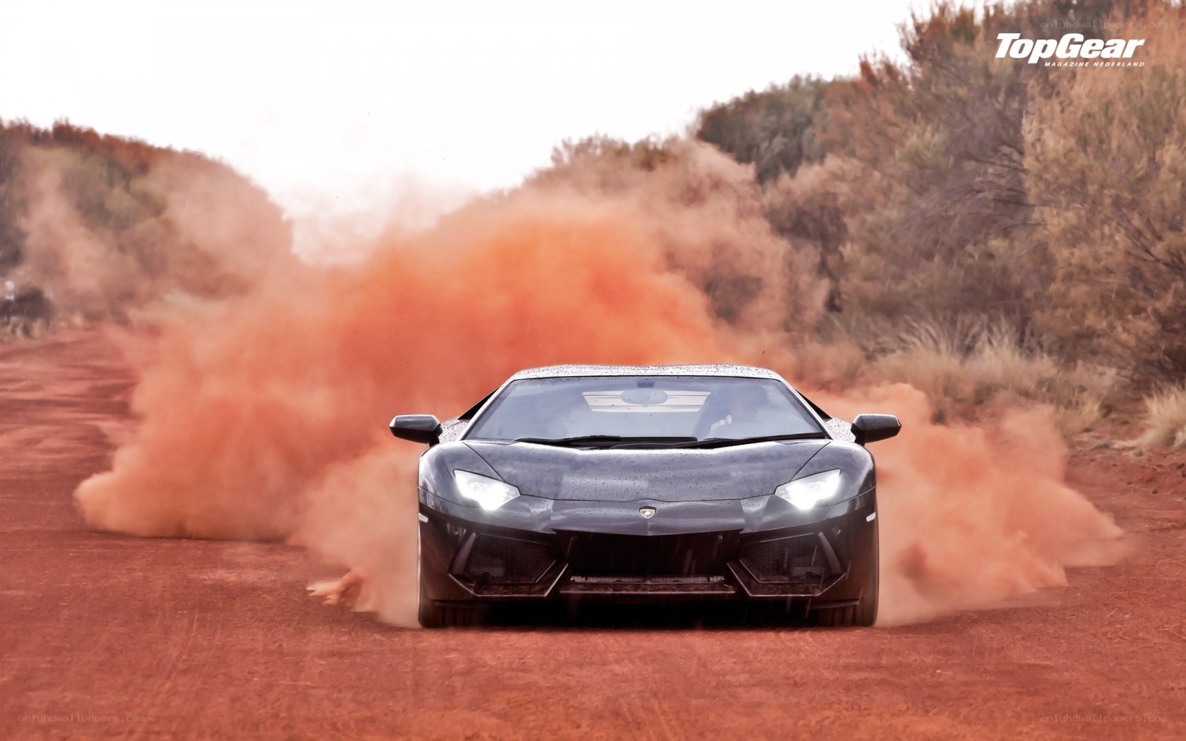 Lamborghini on a dusty road