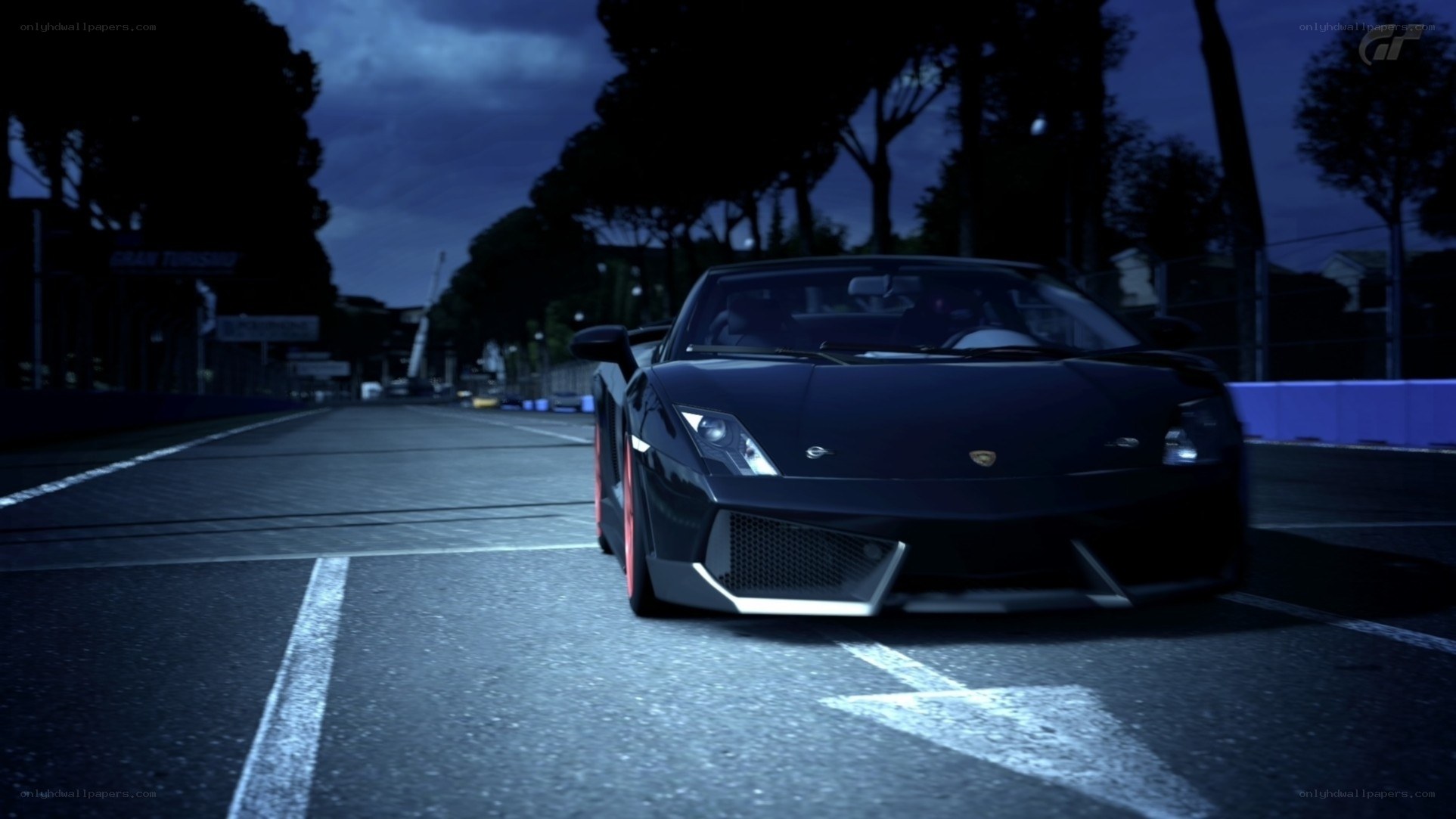 Lamborghini on a racetrack at night