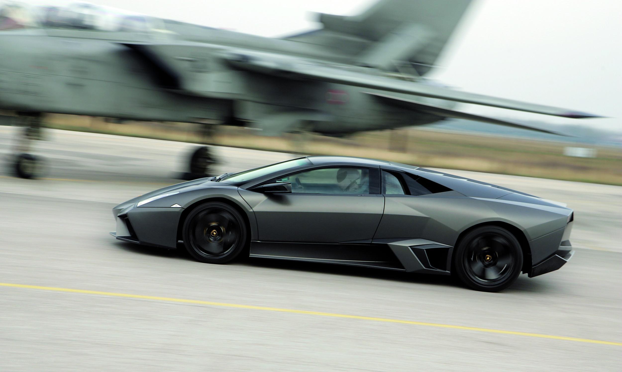 Lamborghini on runway with jet