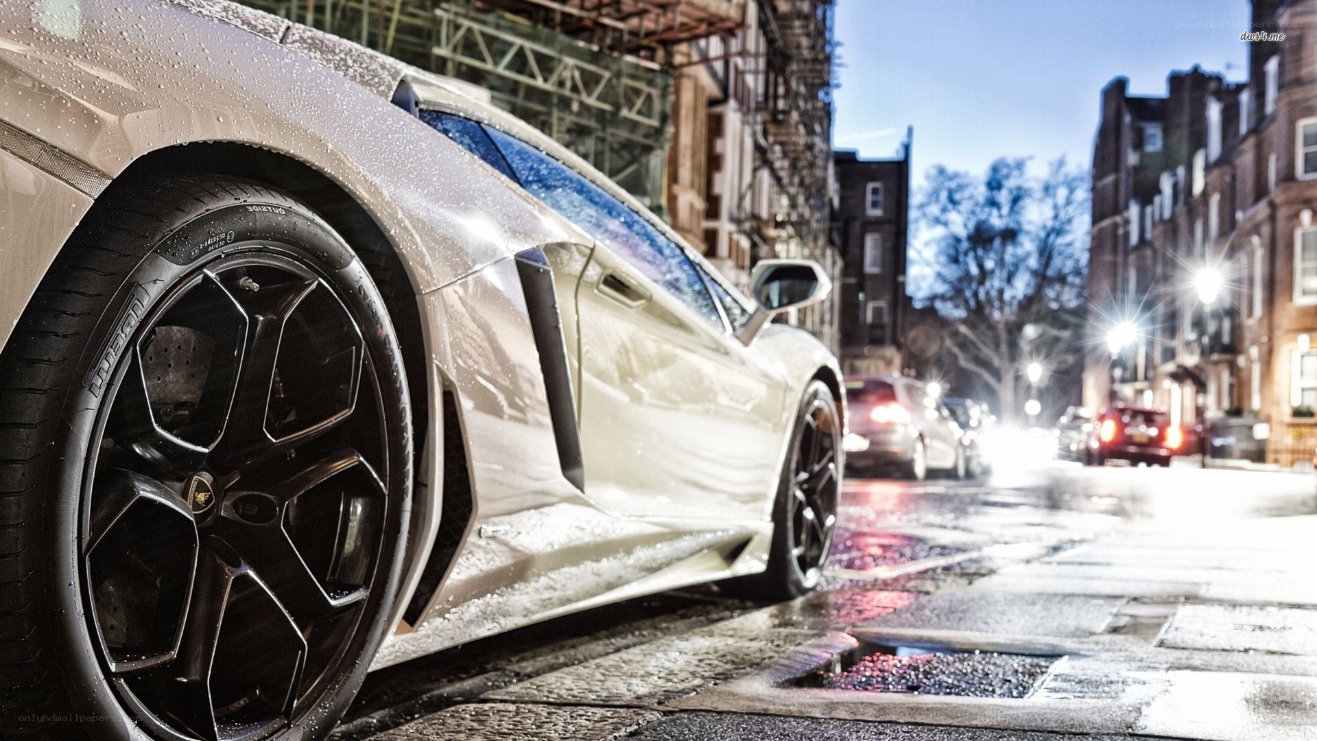 Lamborghini on wet city street