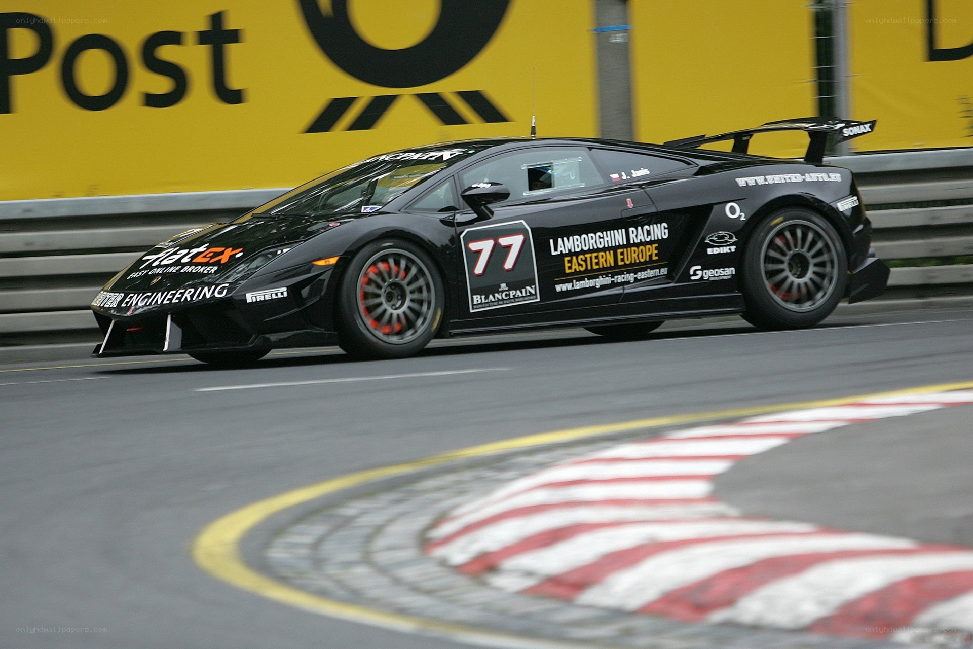 Lamborghini racing on a track