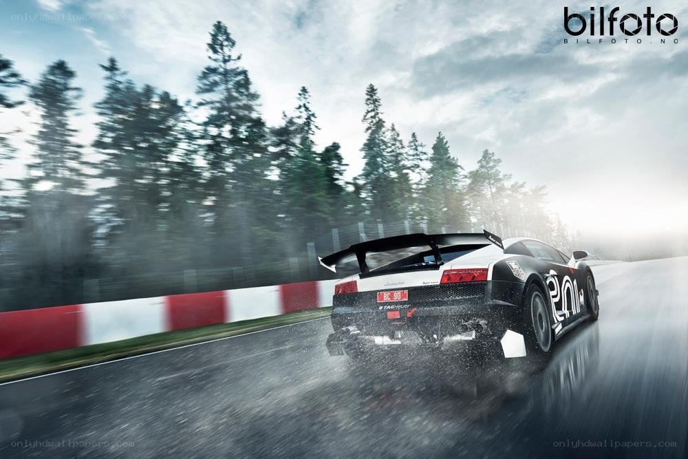 Lamborghini racing on wet track