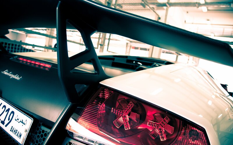 Lamborghini Rear View — White, Dramatic, Photograph