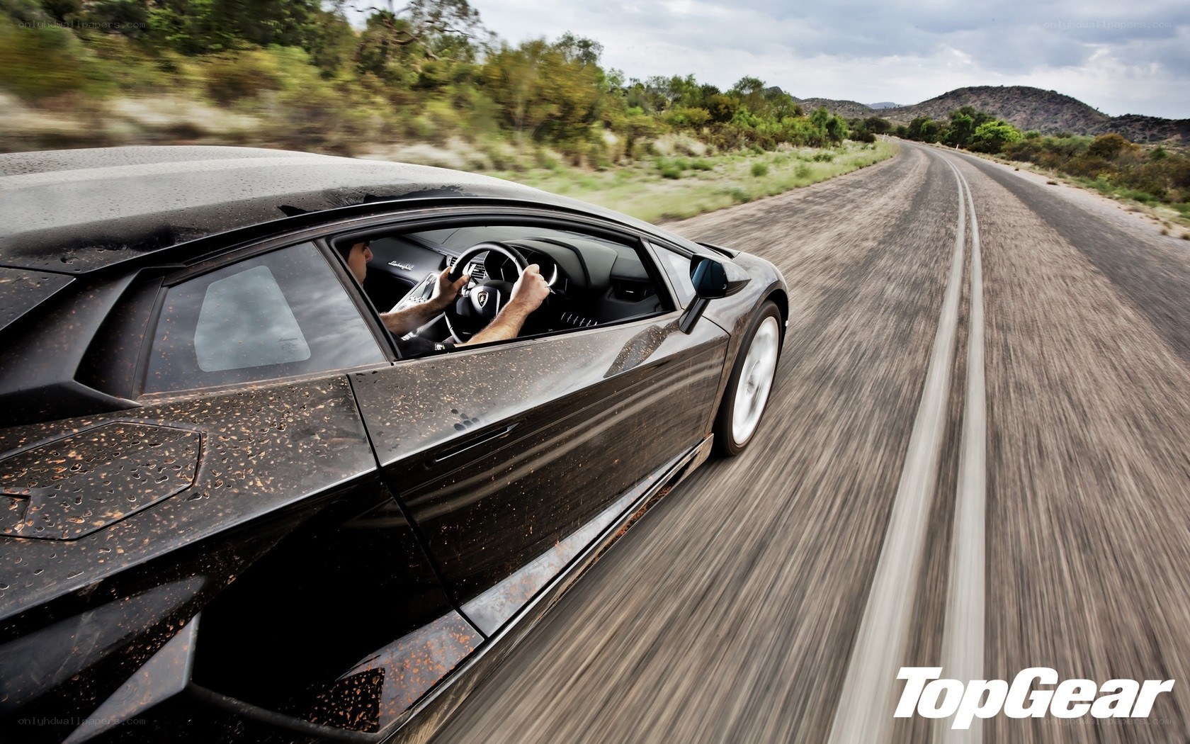Lamborghini speeding on a road