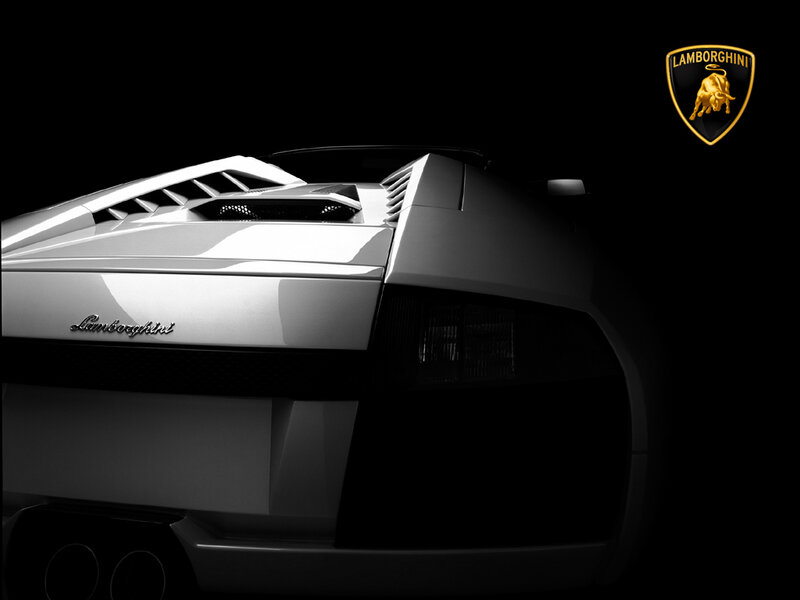 Lamborghini Sports Car — Black, Dramatic, Photograph, Logo, Exhaust