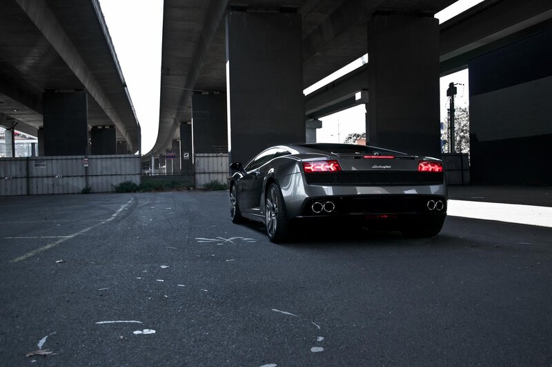 Lamborghini under highway overpass