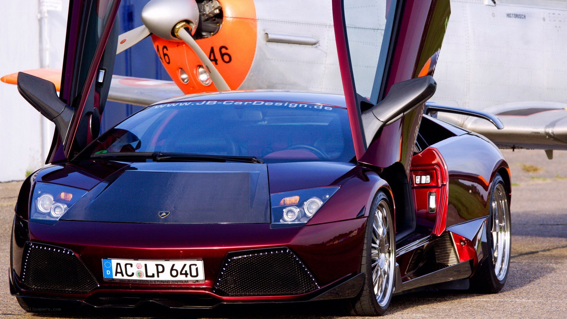 Lamborghini with plane in background