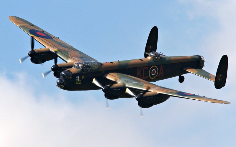 Lancaster Bomber Aircraft — Blue, Dynamic, Afternoon