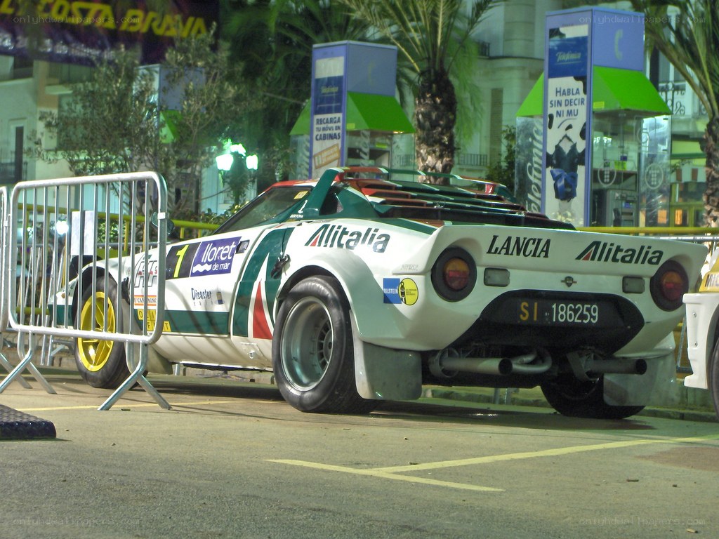 Lancia rally car at night