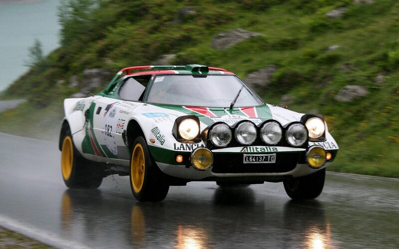 Lancia rally car on wet road